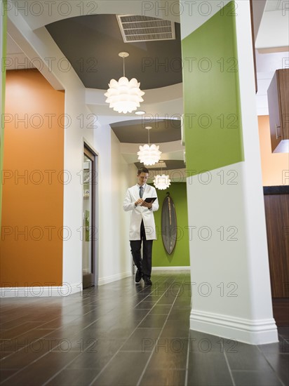 Dentist walking in corridor