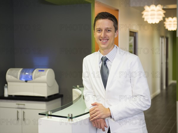 Portrait of smiling dentist