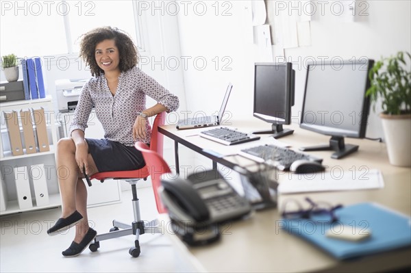 Young woman working at office.