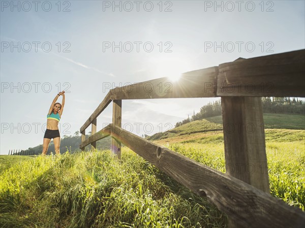 Woman stretching outdoors