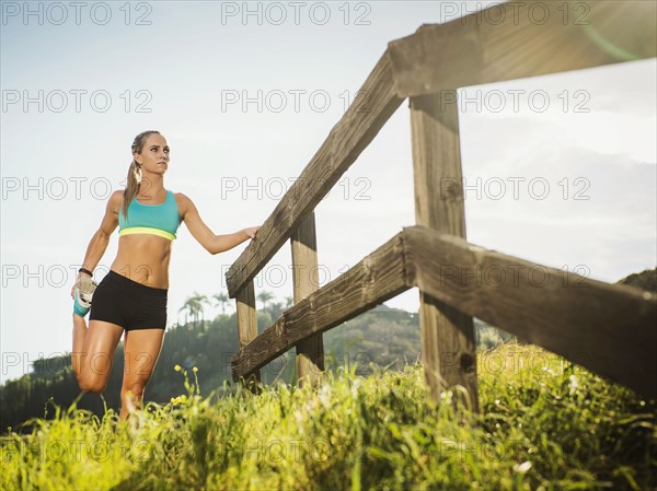 Woman stretching outdoors