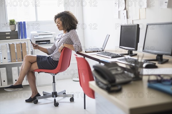 Young woman working at office.