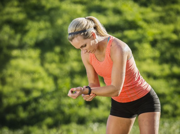 Woman looking at watch