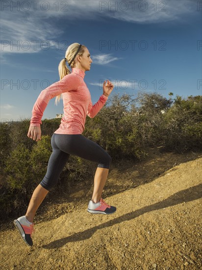 Woman running in mountains