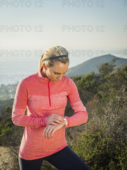 Woman checking watch