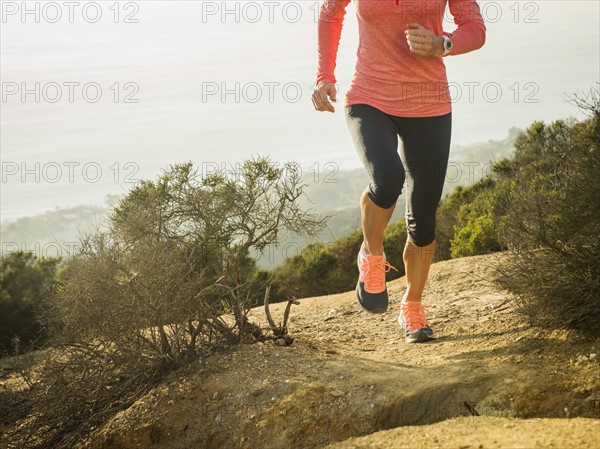 Woman running in mountains