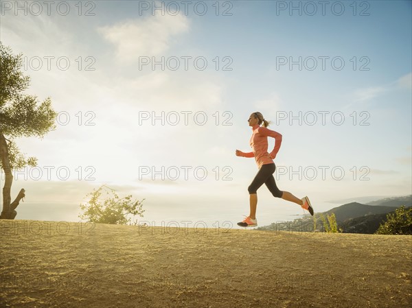 Woman running in mountains