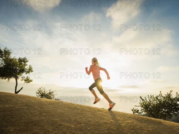 Woman running in mountains