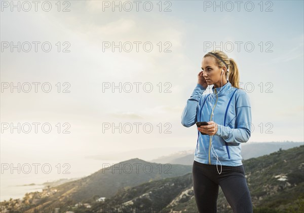 Woman checking smart phone