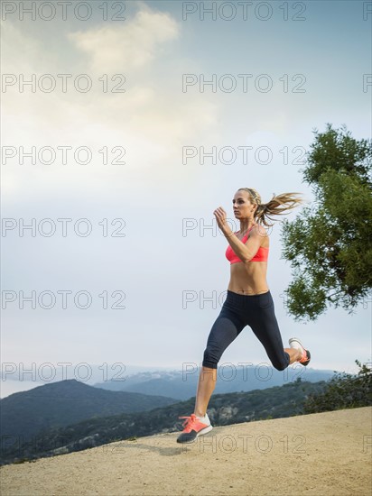 Woman running in mountains