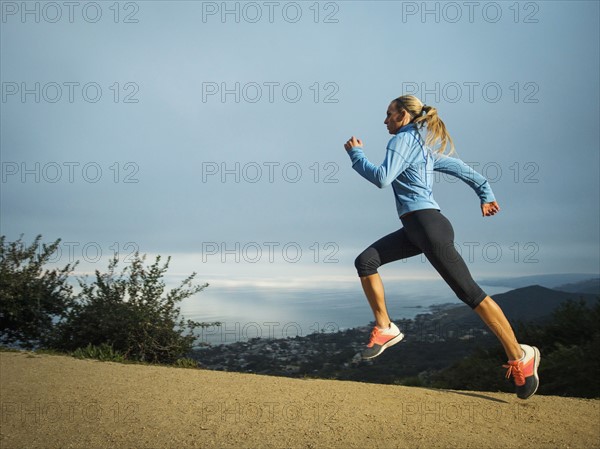 Woman running in mountains