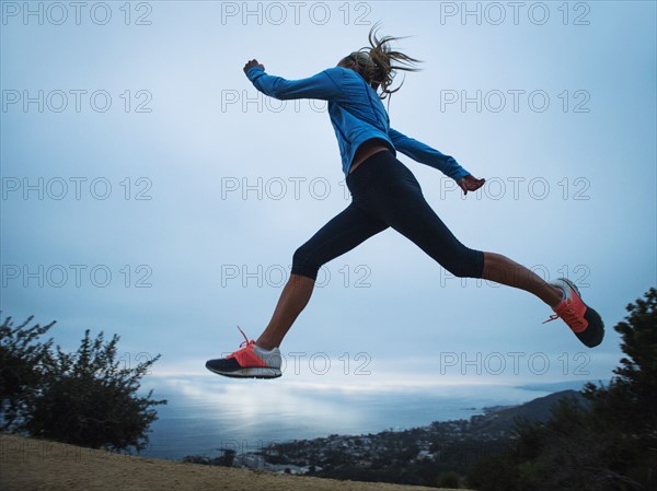 Woman running in mountains