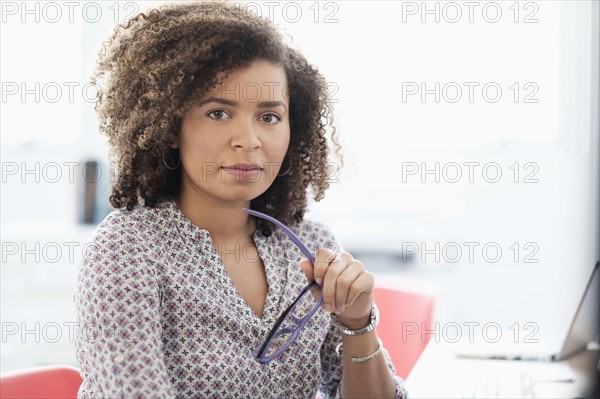 Young woman working at office.