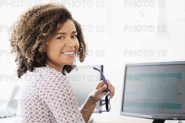 Young woman working at office.