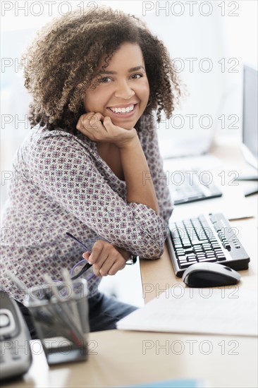 Young woman working at office.