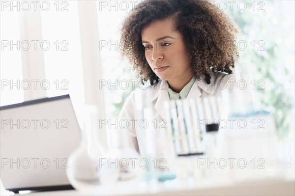 Scientist working on laptop.