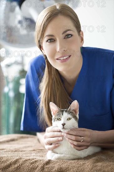 Portrait of vet with cat