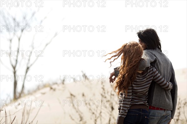 Couple standing on beach