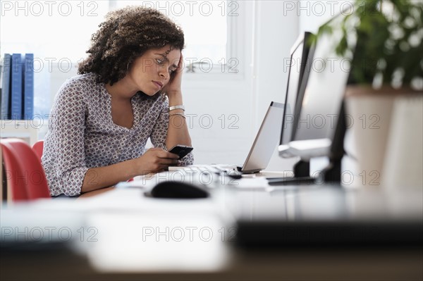 Young woman working at office.