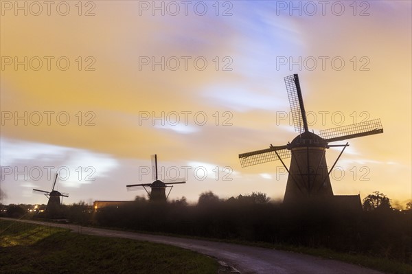 Traditional windmills at sunset