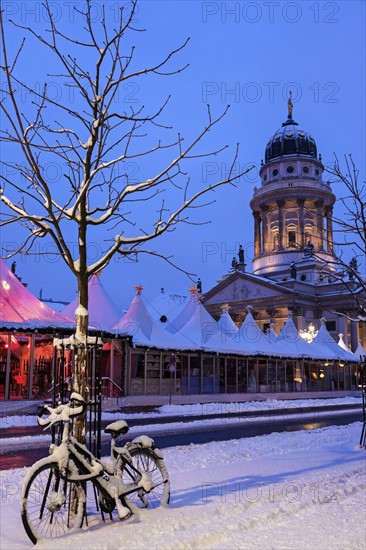 Gendarmenmarkt, Snowy bicycle parked against bare tree