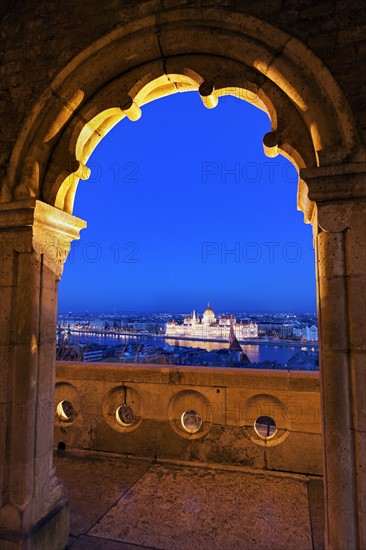 Hungarian Parliament seen through arch of Fisherman's Bastion