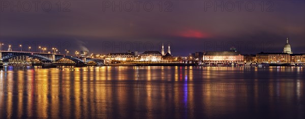 Illuminated waterfront skyline