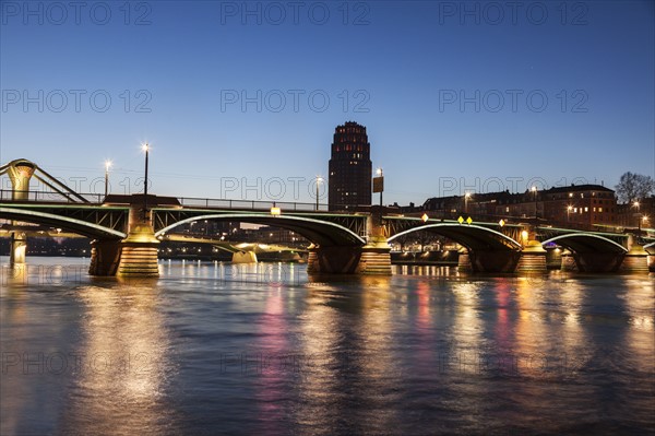 Ignatz-Bubis Bridge illuminated at dusk