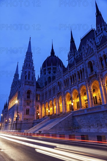 Illuminated Hungarian Parliament and light trails