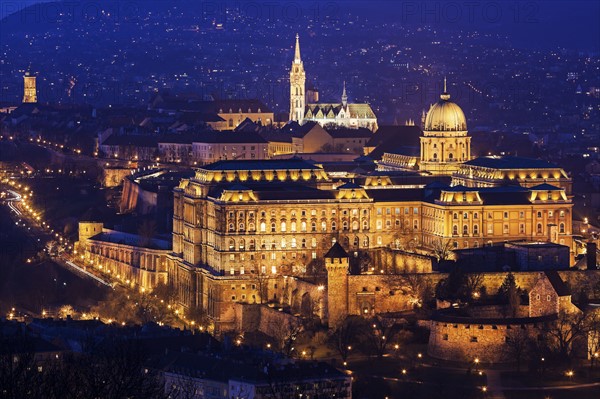 Cityscape with illuminated Royal Palace and Matthias Church