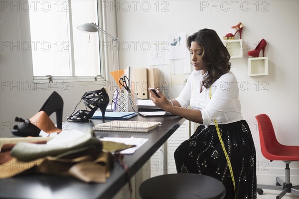 Young woman working in office.