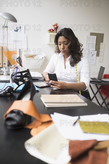 Young woman working in office.