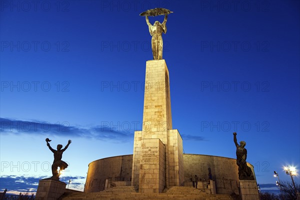 Illuminated Liberty Statue against sky