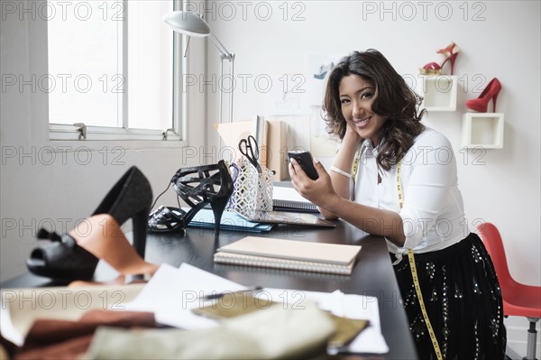 Young woman working in office.