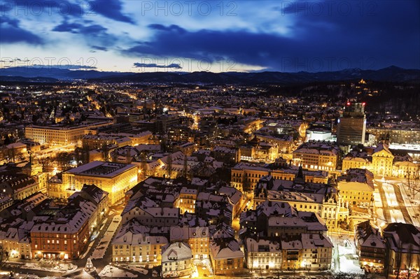 Illuminated cityscape at dusk