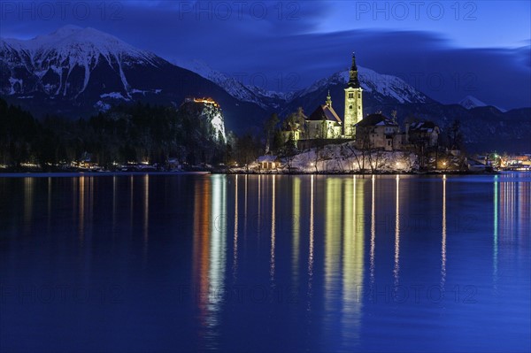 Lake Bled and illuminated Church of the Assumption