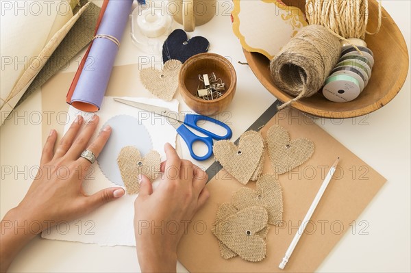 Crafts equipment on table.