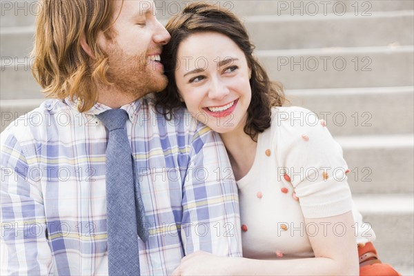 Smiling couple embracing