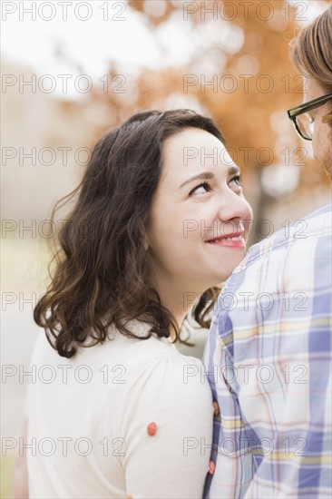 Smiling couple looking at each other