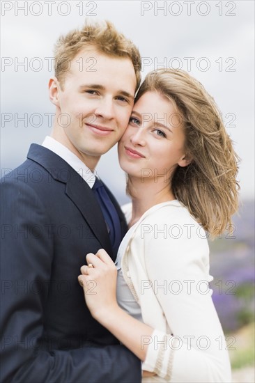 Portrait of newlywed couple