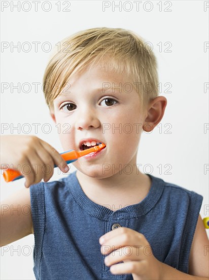 Little boy (2-3) brushing teeth
