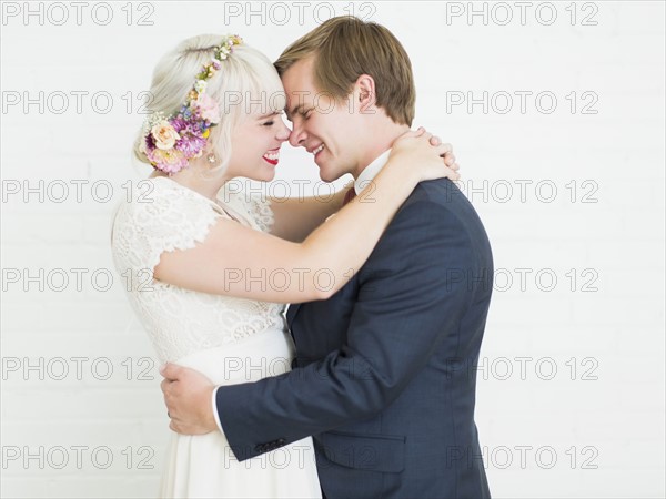Portrait of smiling newlywed couple