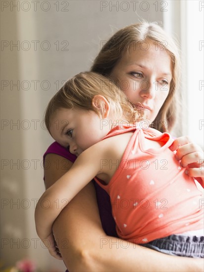 Mather carrying daughter (2-3)