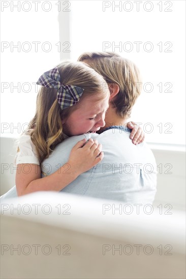 Woman consoling her child (4-5)