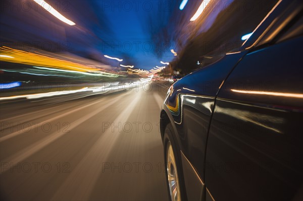 Car speeding through street