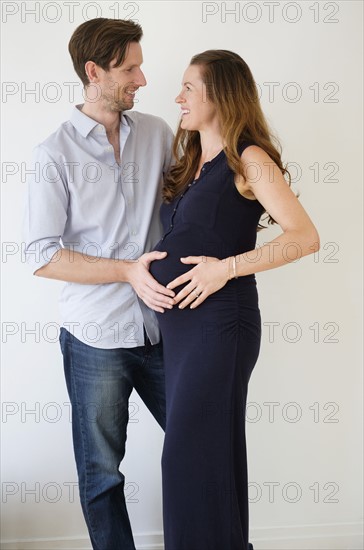 Portrait of content couple looking at each other.