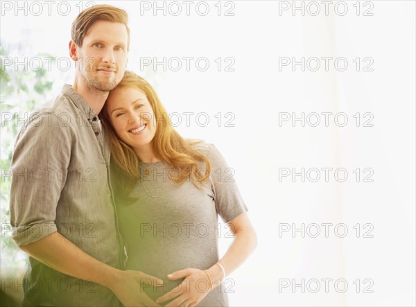 Portrait of mid-adult couple outdoors.