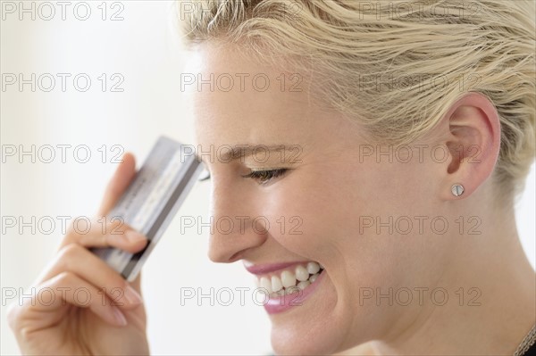 Young woman spending money.