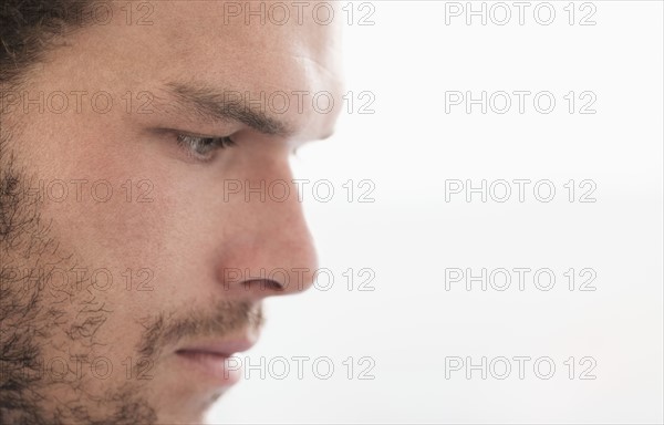 Side-view of pensive businessman.