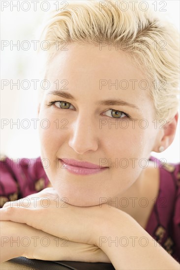 Portrait of young woman indoors.